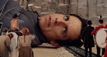Movie still from “Night at the Museum” (2006), directed by Shawn Levy – A man laying on the ground with his eyes wide open; Close Up shot, Overhead angle