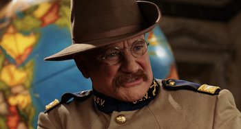 Movie still from “Night at the Museum” (2006), directed by Shawn Levy – An older man in a uniform and a hat; Close Up shot, Over the shoulder angle