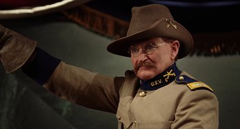 Movie still from “Night at the Museum” (2006), directed by Shawn Levy – A man dressed as an army officer in a uniform; Close Up shot, Over the shoulder angle