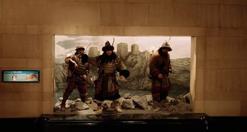 Movie still from “Night at the Museum” (2006), directed by Shawn Levy – A group of men dressed in medieval costumes; Wide shot, Low angle