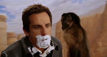 Movie still from “Night at the Museum” (2006), directed by Shawn Levy – Ben stiller shaving his face with shaving cream on top of his face; Close Up shot, Over the shoulder angle