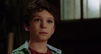 Movie still from “Night at the Museum” (2006), directed by Shawn Levy – A young boy is looking into the distance; Close Up shot, High angle