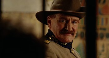 Movie still from “Night at the Museum” (2006), directed by Shawn Levy – An old man in a hat and a uniform; Close Up shot, Over the shoulder angle