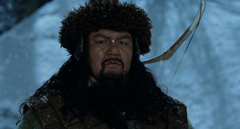 Movie still from “Night at the Museum” (2006), directed by Shawn Levy – A person with a bow and arrow; Close Up shot, Low angle