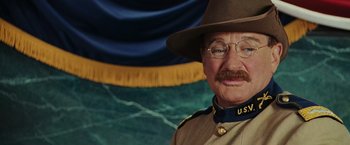 Movie still from “Night at the Museum: Battle of the Smithsonian” (2009), directed by Shawn Levy – An old man in a uniform and a hat; Close Up shot, Over the shoulder angle