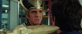 Movie still from “Night at the Museum: Battle of the Smithsonian” (2009), directed by Shawn Levy – A person wearing a helmet; Close Up shot, Over the shoulder angle