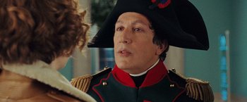 Movie still from “Night at the Museum: Battle of the Smithsonian” (2009), directed by Shawn Levy – A person wearing a hat; Close Up shot, Over the shoulder angle