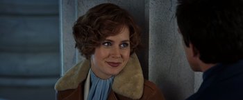 Movie still from “Night at the Museum: Battle of the Smithsonian” (2009), directed by Shawn Levy – A person wearing a jacket; Close Up shot, Over the shoulder angle