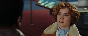 Movie still from “Night at the Museum: Battle of the Smithsonian” (2009), directed by Shawn Levy – A person wearing a jacket; Close Up shot, Over the shoulder angle