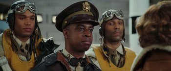 Movie still from “Night at the Museum: Battle of the Smithsonian” (2009), directed by Shawn Levy – A man in a military uniform is next to another man in an air force uniform; Close Up shot, Low angle