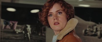 Movie still from “Night at the Museum: Battle of the Smithsonian” (2009), directed by Shawn Levy – A person with short hair; Close Up shot, Over the shoulder angle