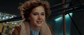 Movie still from “Night at the Museum: Battle of the Smithsonian” (2009), directed by Shawn Levy – A person wearing a jacket; Close Up shot, Over the shoulder angle