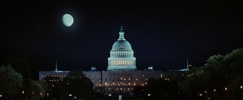 Movie still from “Night at the Museum: Battle of the Smithsonian” (2009), directed by Shawn Levy – The full moon shines over the dome of the united states capitol building; Extreme Wide shot, Low angle
