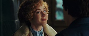 Movie still from “Night at the Museum: Battle of the Smithsonian” (2009), directed by Shawn Levy – A person wearing a jacket; Close Up shot, Over the shoulder angle