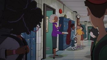 Movie still from “Night at the Museum: Kahmunrah Rises Again” (2022), directed by Justin Lovell – An animated scene of a woman in a school hallway; Extreme Wide shot, Over the shoulder angle