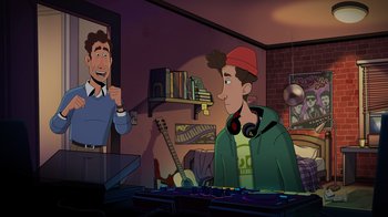 Movie still from “Night at the Museum: Kahmunrah Rises Again” (2022), directed by Justin Lovell – A man and a boy are sitting in front of a microphone; Medium shot, Overhead angle