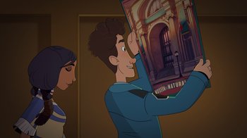 Movie still from “Night at the Museum: Kahmunrah Rises Again” (2022), directed by Justin Lovell – A man and woman looking at a poster of a building; Medium shot, Over the shoulder angle