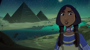 Movie still from “Night at the Museum: Kahmunrah Rises Again” (2022), directed by Justin Lovell – An animated scene of a woman standing in front of pyramids; Close Up shot, Over the shoulder angle