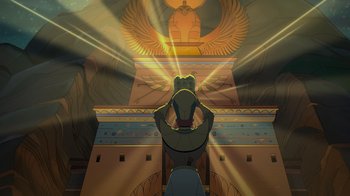 Movie still from “Night at the Museum: Kahmunrah Rises Again” (2022), directed by Justin Lovell – An egyptian scene with a person looking up at an egyptian statue; Extreme Wide shot, Low angle