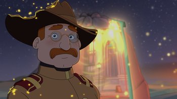 Movie still from “Night at the Museum: Kahmunrah Rises Again” (2022), directed by Justin Lovell – An animated picture of a man with a hat and glasses; Close Up shot, Over the shoulder angle