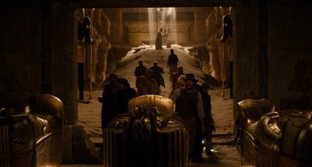 Movie still from “Night at the Museum: Secret of the Tomb” (2014), directed by Shawn Levy – A group of people standing in a room with statues; Extreme Wide shot, High angle