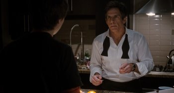 Movie still from “Night at the Museum: Secret of the Tomb” (2014), directed by Shawn Levy – A man in a white dress shirt and black bow ties; Medium shot, Over the shoulder angle
