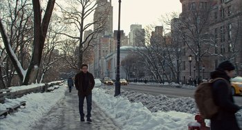Movie still from “Night at the Museum: Secret of the Tomb” (2014), directed by Shawn Levy – A man standing on the side of a road in the snow; Wide shot, High angle