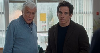Movie still from “Night at the Museum: Secret of the Tomb” (2014), directed by Shawn Levy – Two men standing next to each other in front of a window; Medium shot, Over the shoulder angle