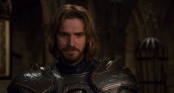 Movie still from “Night at the Museum: Secret of the Tomb” (2014), directed by Shawn Levy – A person wearing a suit of armor; Close Up shot, Over the shoulder angle