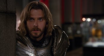 Movie still from “Night at the Museum: Secret of the Tomb” (2014), directed by Shawn Levy – A person wearing armor; Close Up shot, Over the shoulder angle