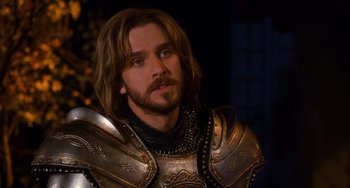 Movie still from “Night at the Museum: Secret of the Tomb” (2014), directed by Shawn Levy – A person wearing a suit of armor; Close Up shot, Over the shoulder angle