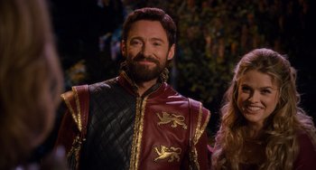 Movie still from “Night at the Museum: Secret of the Tomb” (2014), directed by Shawn Levy – A man with a beard wearing a red and black jacket; Medium shot, Over the shoulder angle