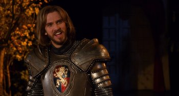 Movie still from “Night at the Museum: Secret of the Tomb” (2014), directed by Shawn Levy – A person wearing a suit of armor; Medium shot, Over the shoulder angle