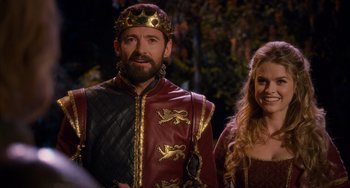 Movie still from “Night at the Museum: Secret of the Tomb” (2014), directed by Shawn Levy – A man and a woman dressed up in medieval clothing; Medium shot, Over the shoulder angle