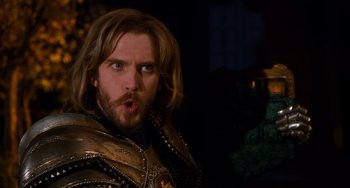Movie still from “Night at the Museum: Secret of the Tomb” (2014), directed by Shawn Levy – A person with long hair and a beard; Close Up shot, Over the shoulder angle