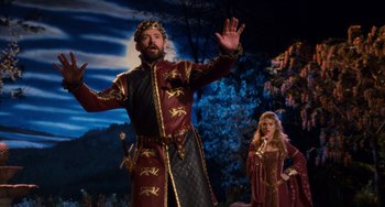 Movie still from “Night at the Museum: Secret of the Tomb” (2014), directed by Shawn Levy – A man and a woman dressed in medieval costumes; Wide shot, Low angle