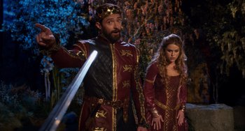 Movie still from “Night at the Museum: Secret of the Tomb” (2014), directed by Shawn Levy – A man and a woman dressed in medieval clothing; Medium shot, Over the shoulder angle