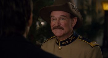 Movie still from “Night at the Museum: Secret of the Tomb” (2014), directed by Shawn Levy – An old man in a military uniform talking to a man; Close Up shot, Over the shoulder angle