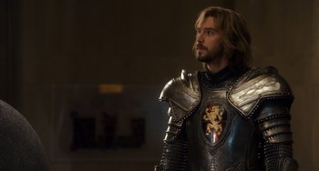 Movie still from “Night at the Museum: Secret of the Tomb” (2014), directed by Shawn Levy – A person wearing a suit of armor; Medium shot, Over the shoulder angle