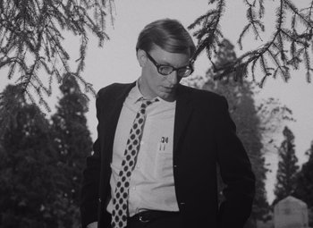 Movie still from “Night of the Living Dead” (1968), directed by George A. Romero – Medium shot, Low angle