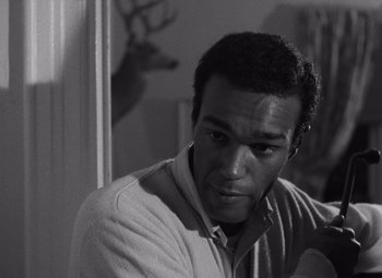 Movie still from “Night of the Living Dead” (1968), directed by George A. Romero – Close Up shot, Over the shoulder angle