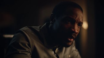 Movie still from “Euphoria” (2019), created by Sam Levinson – A person wearing a dress shirt; Close Up shot, Low angle