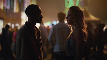 Movie still from “Euphoria” (2019), created by Sam Levinson – A man and a woman standing next to each other; Medium shot, Low angle