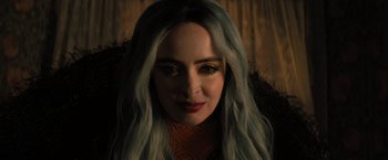 Movie still from “Nightbooks” (2021), directed by David Yarovesky – A person with long white hair; Close Up shot, Over the shoulder angle