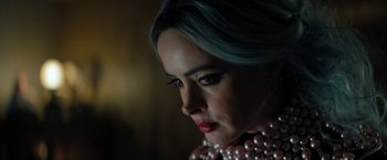 Movie still from “Nightbooks” (2021), directed by David Yarovesky – A person wearing a necklace; Close Up shot, Over the shoulder angle