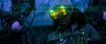 Movie still from “Nightbooks” (2021), directed by David Yarovesky – A person wearing goggles and a hat; Medium shot, Low angle