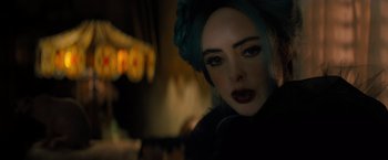 Movie still from “Nightbooks” (2021), directed by David Yarovesky – A person wearing a black outfit; Close Up shot, Over the shoulder angle