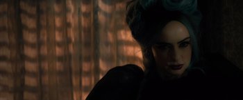 Movie still from “Nightbooks” (2021), directed by David Yarovesky – A person wearing a black jacket; Close Up shot, Over the shoulder angle