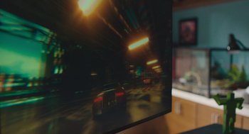 Movie still from “No Hard Feelings” (2023), directed by Gene Stupnitsky – A computer screen showing a car driving down a street; Extreme Close Up shot, High angle