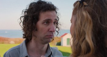 Movie still from “No Hard Feelings” (2023), directed by Gene Stupnitsky – A person talking to another person; Close Up shot, Over the shoulder angle